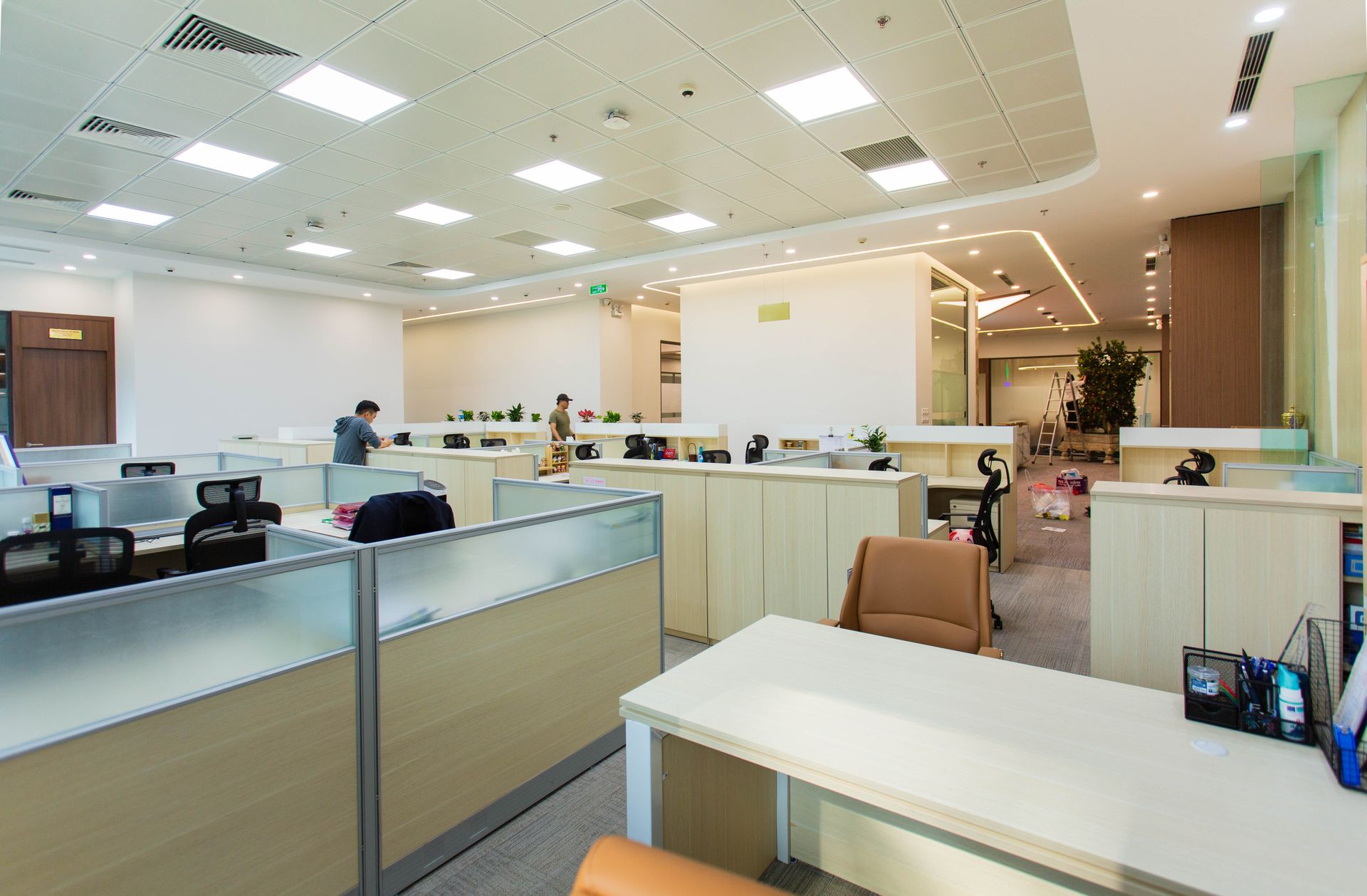 Bright, empty open-plan office floor in a commercial facility