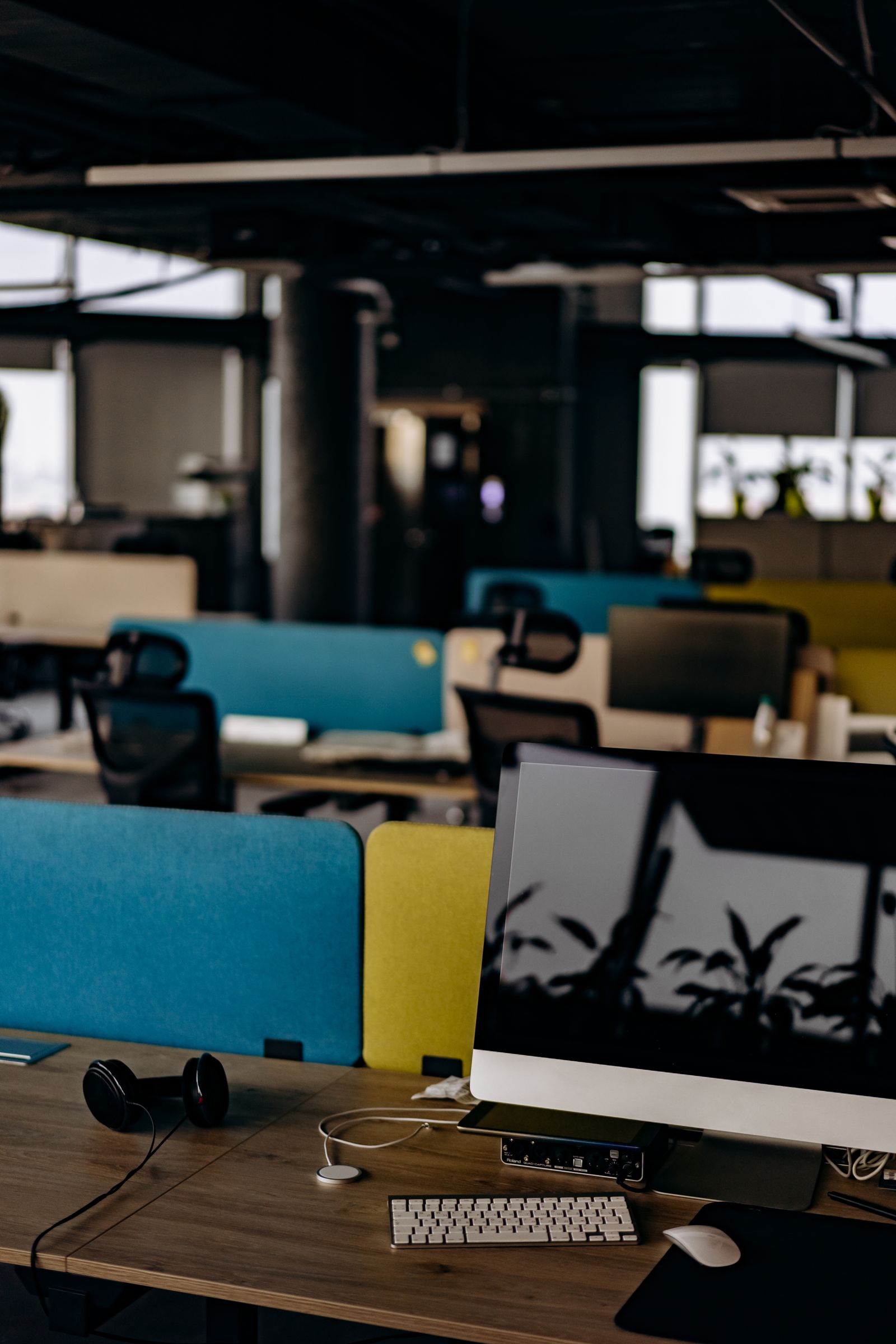 Office desk with a desktop computer in a modern workplace